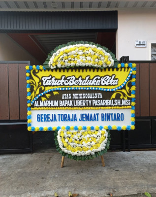 Papan Bunga Duka di Hantakan